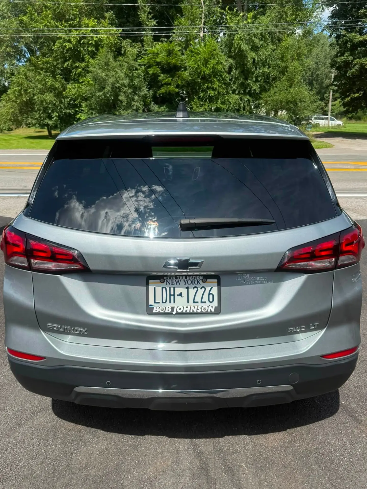 Rear of a freshly detailed Chevrolet Equinox with clean glass and trim